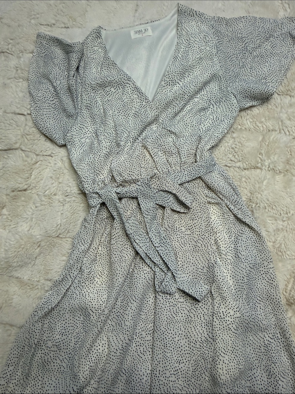 Sienna Sky White and Black Speckled Asymmetrical Wrap Dress